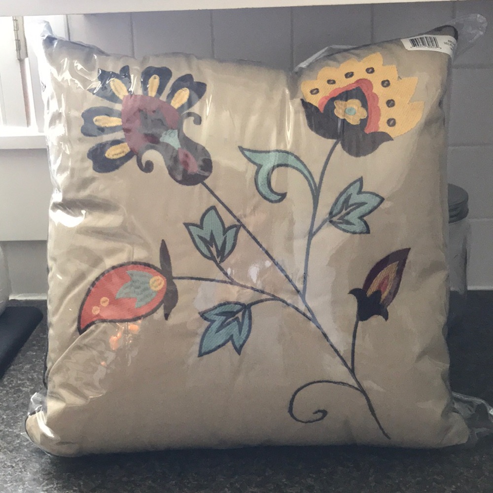 Tan flower bed throw pillows